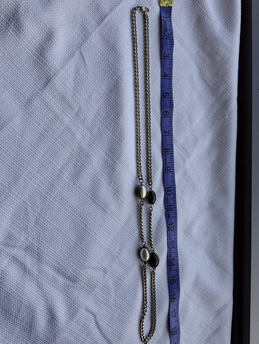 Silver Chain Necklace with Black and White Oval Accents